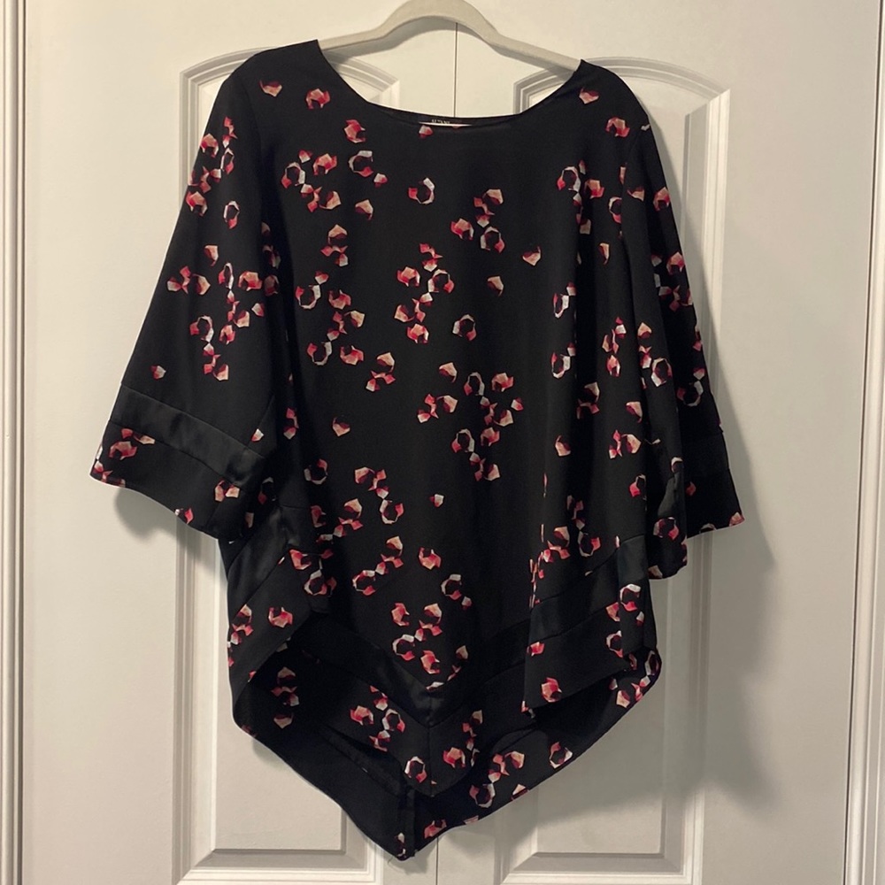 Stylish black blouse with pink and white pattern with handkerchief hemline